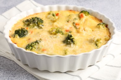 Photo of Delicious vegetable casserole on light table, closeup