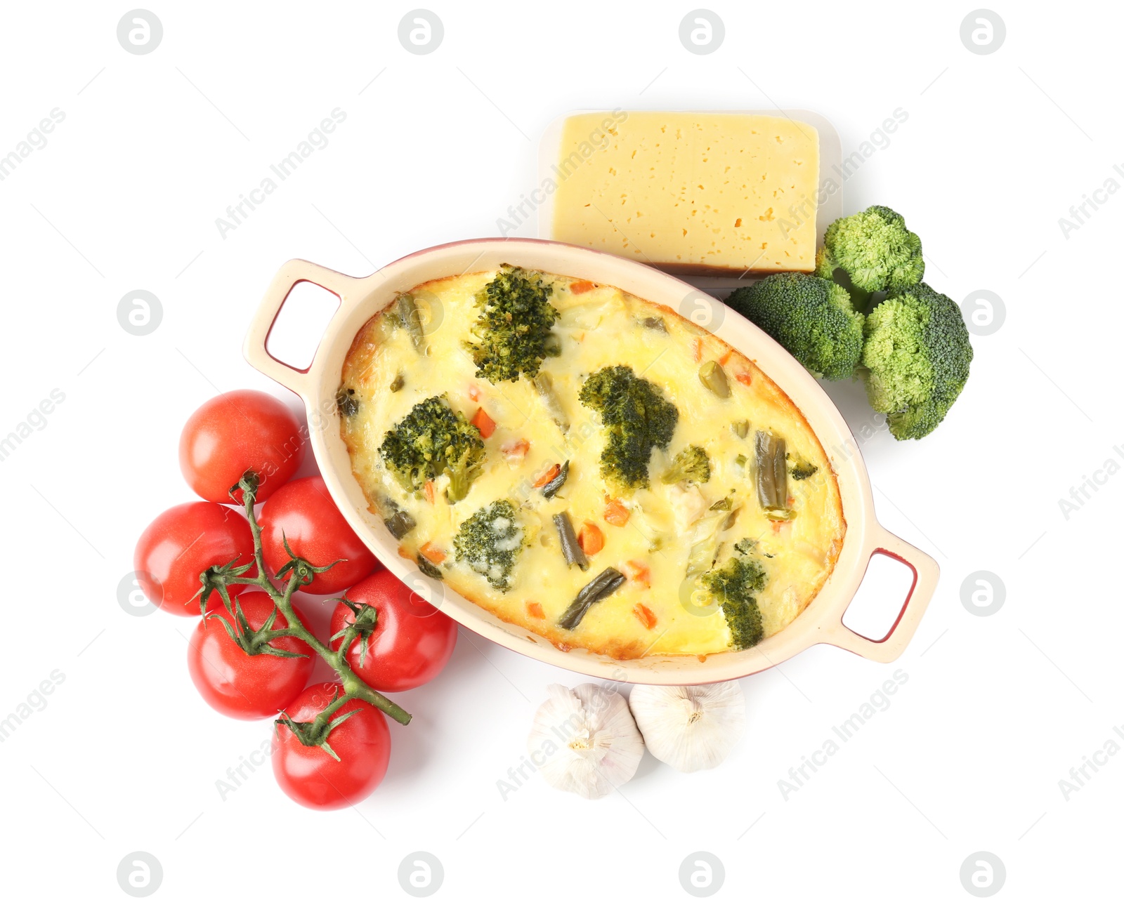 Photo of Delicious vegetable casserole and ingredients isolated on white, top view