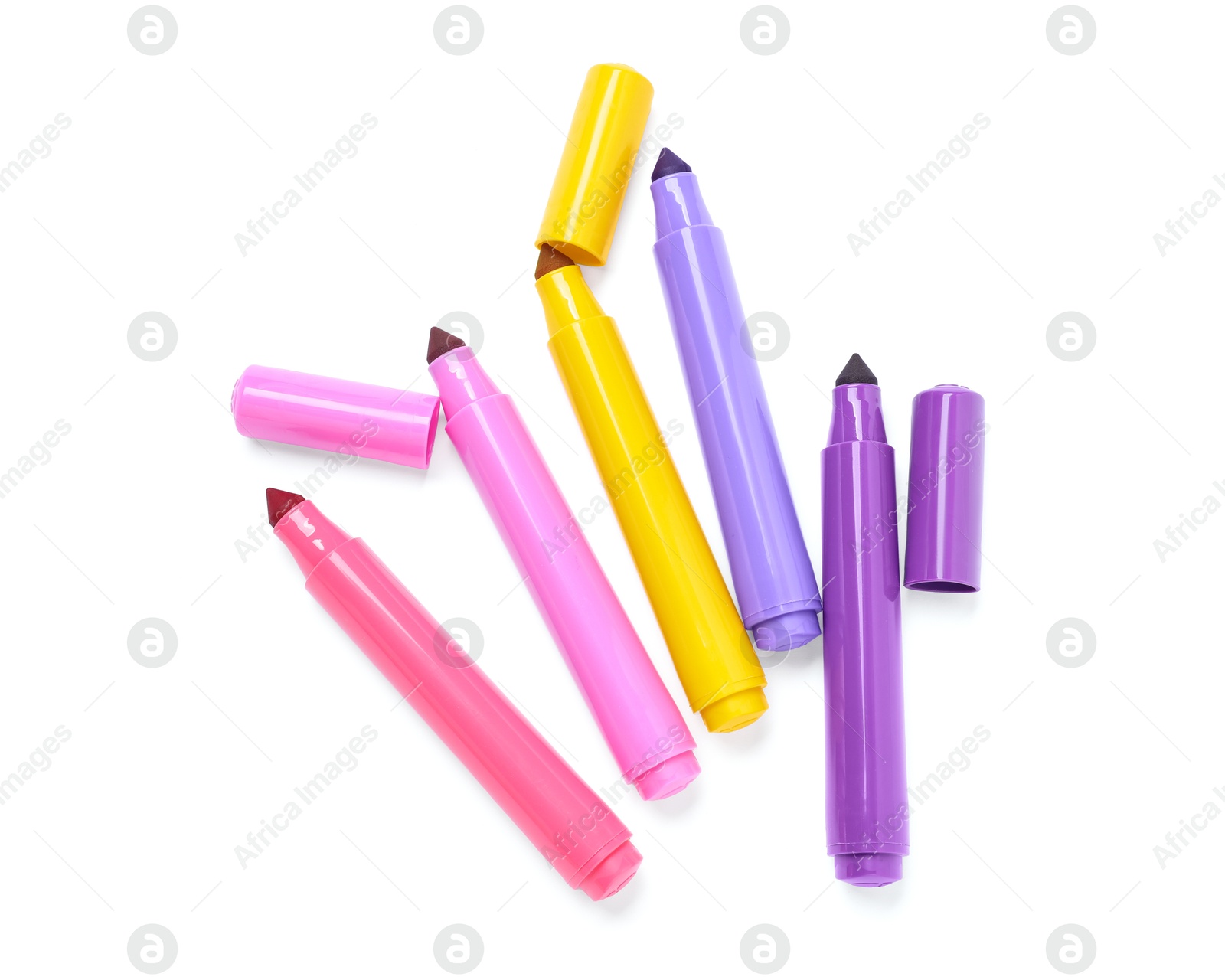 Photo of Many colorful markers and caps isolated on white, top view