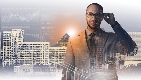 Image of Business success. Multiple exposure of man, graphs and cityscape