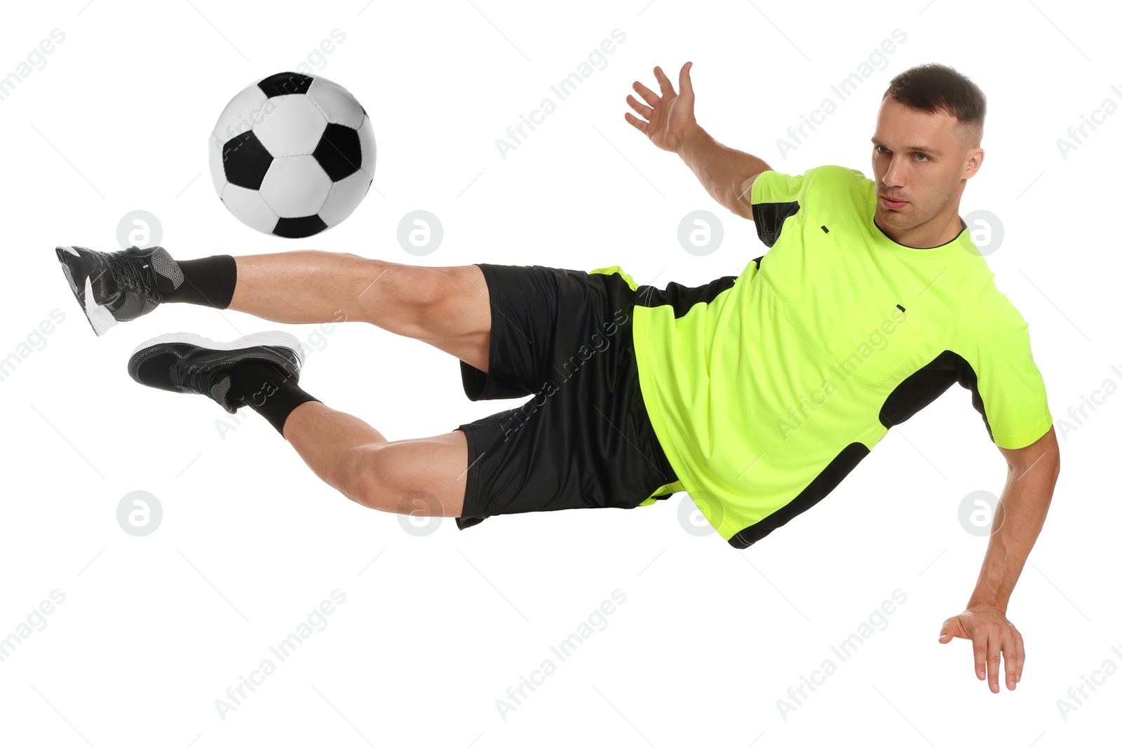 Image of Football player in sportswear kicking soccer ball on white background