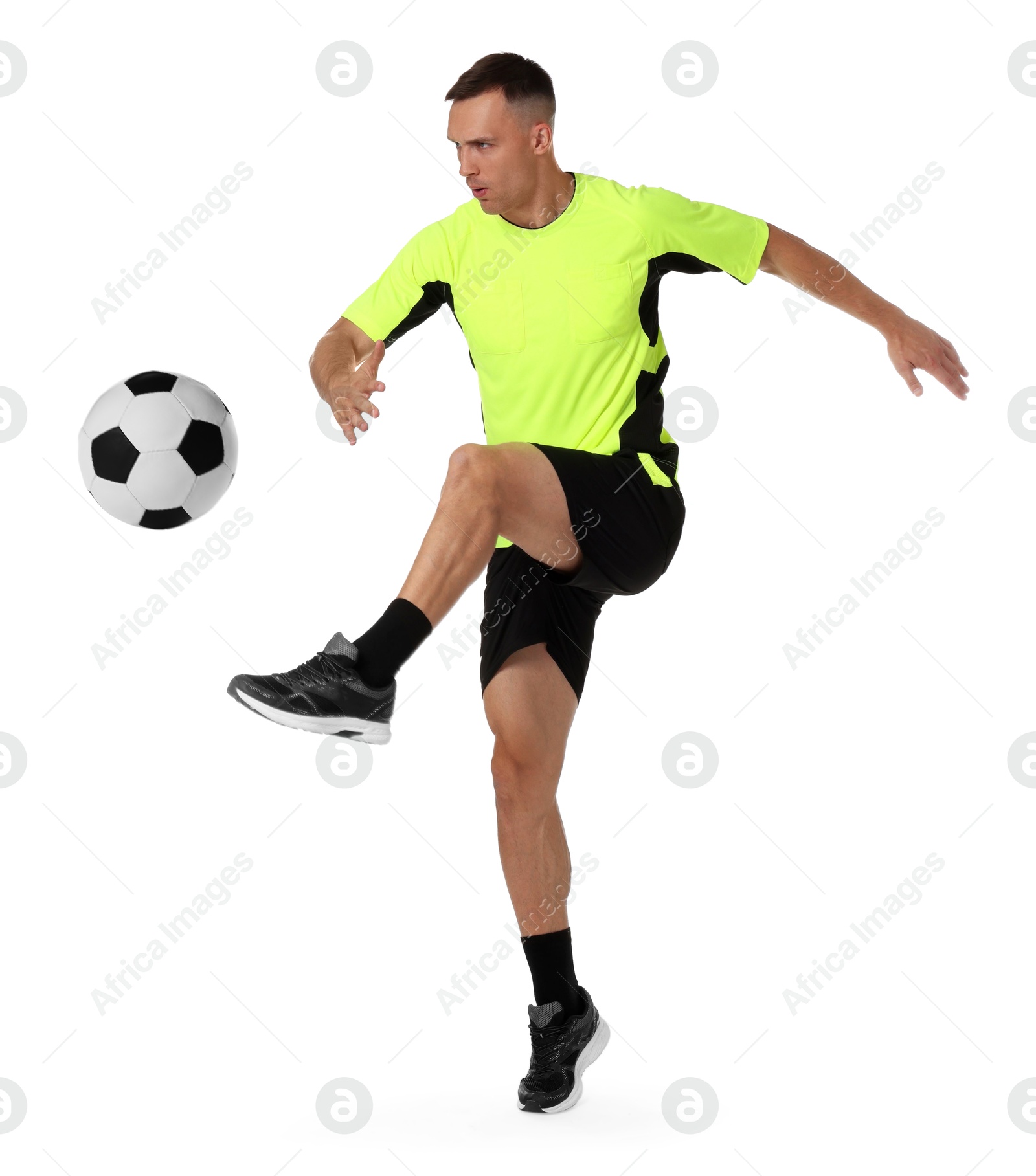 Image of Football player in sportswear kicking soccer ball on white background