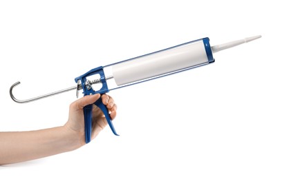 Photo of Woman with glue gun on white background, closeup