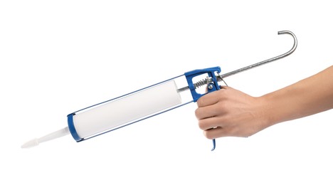 Photo of Woman with glue gun on white background, closeup