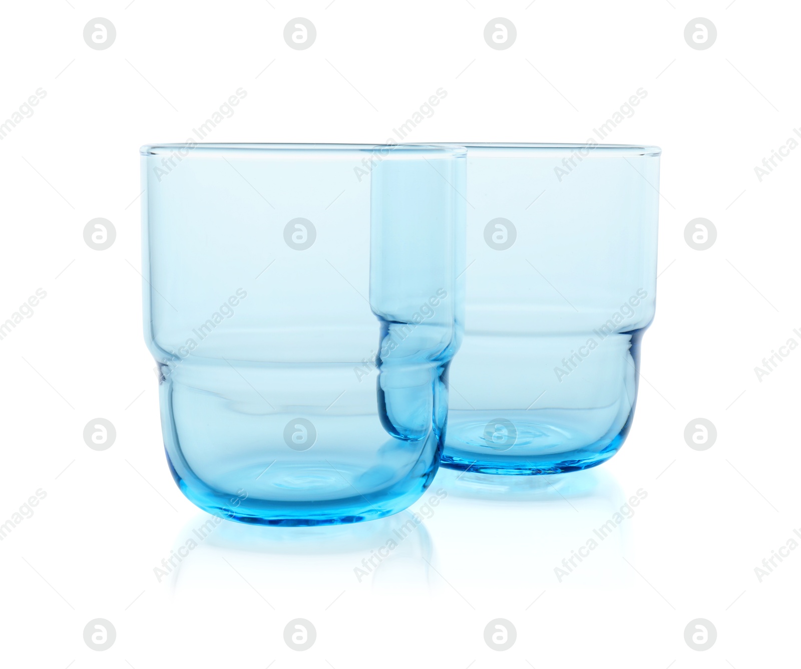 Photo of Two empty clean glasses isolated on white