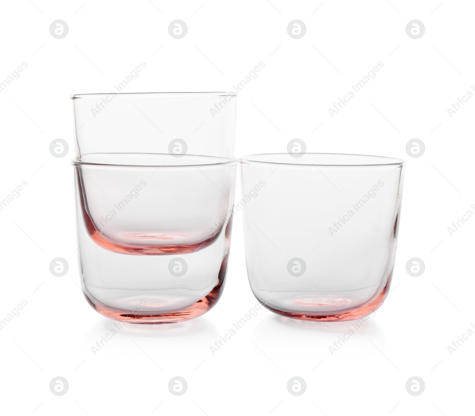 Photo of Three empty clean glasses isolated on white