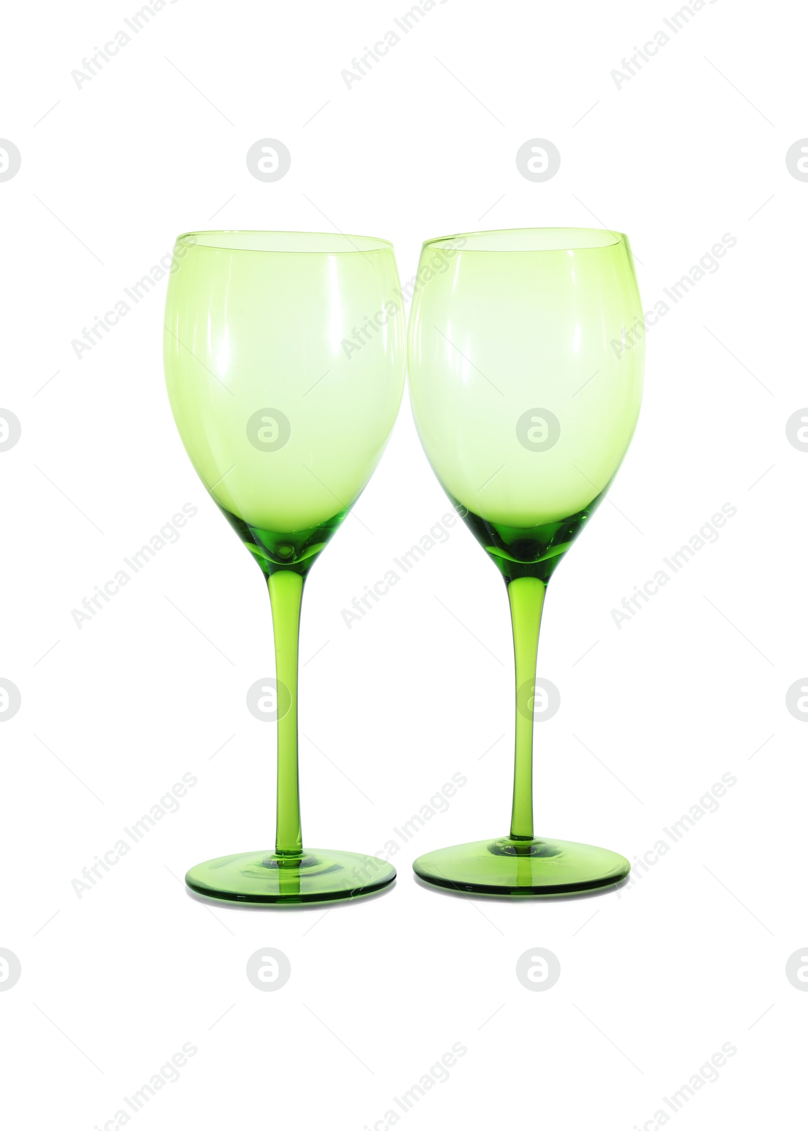 Photo of Two empty clean glasses isolated on white