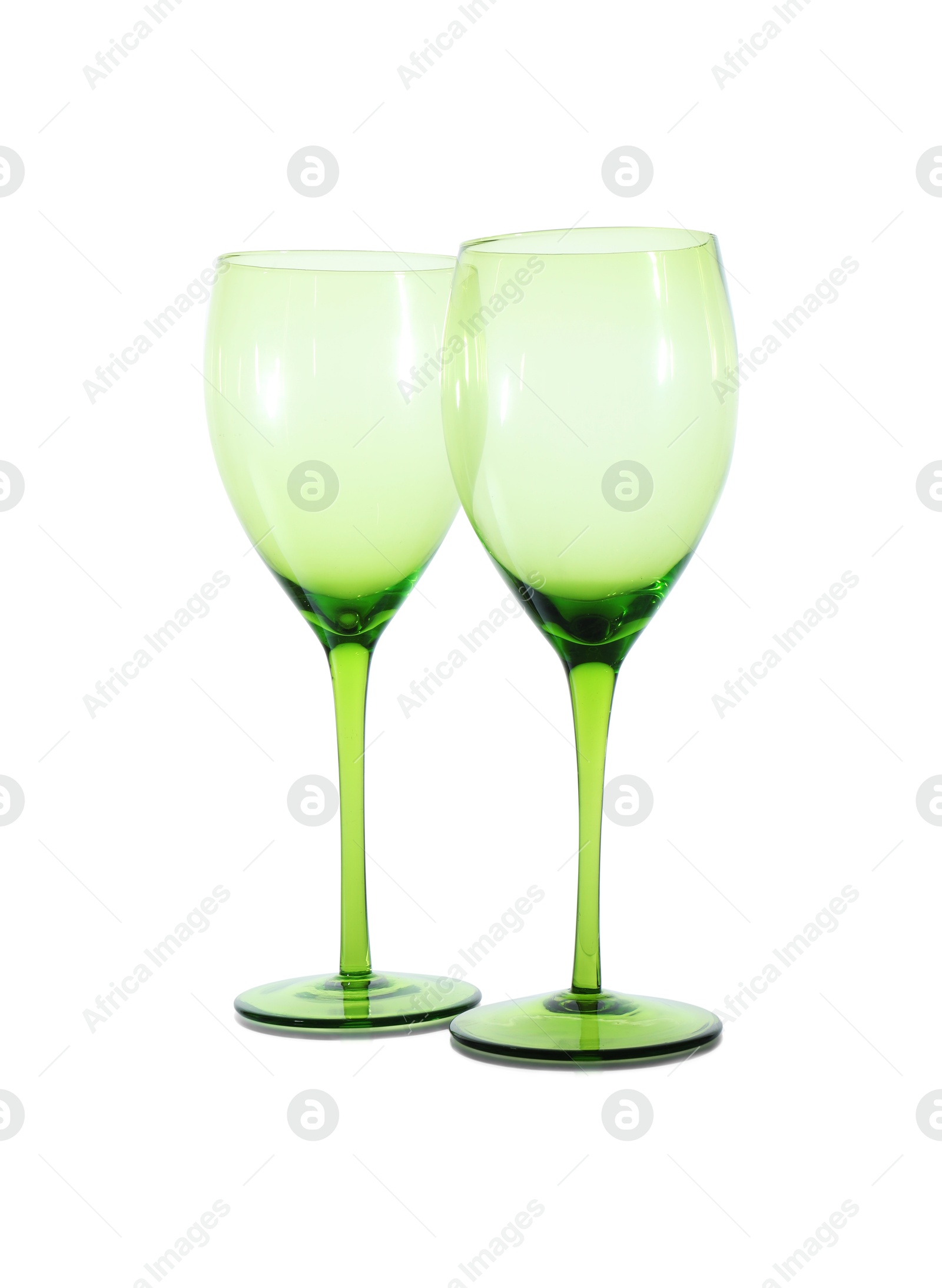 Photo of Two empty clean glasses isolated on white