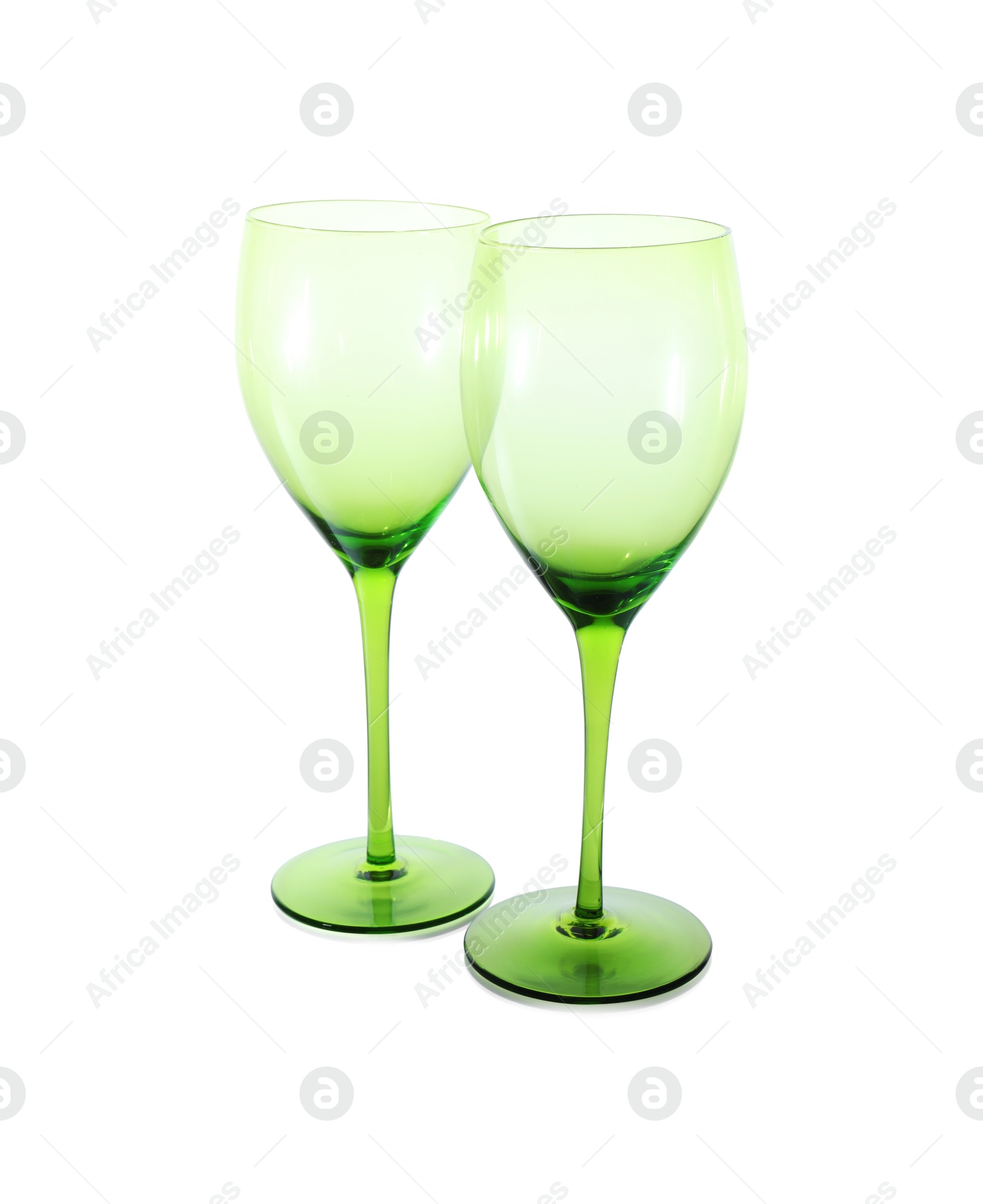 Photo of Two empty clean glasses isolated on white