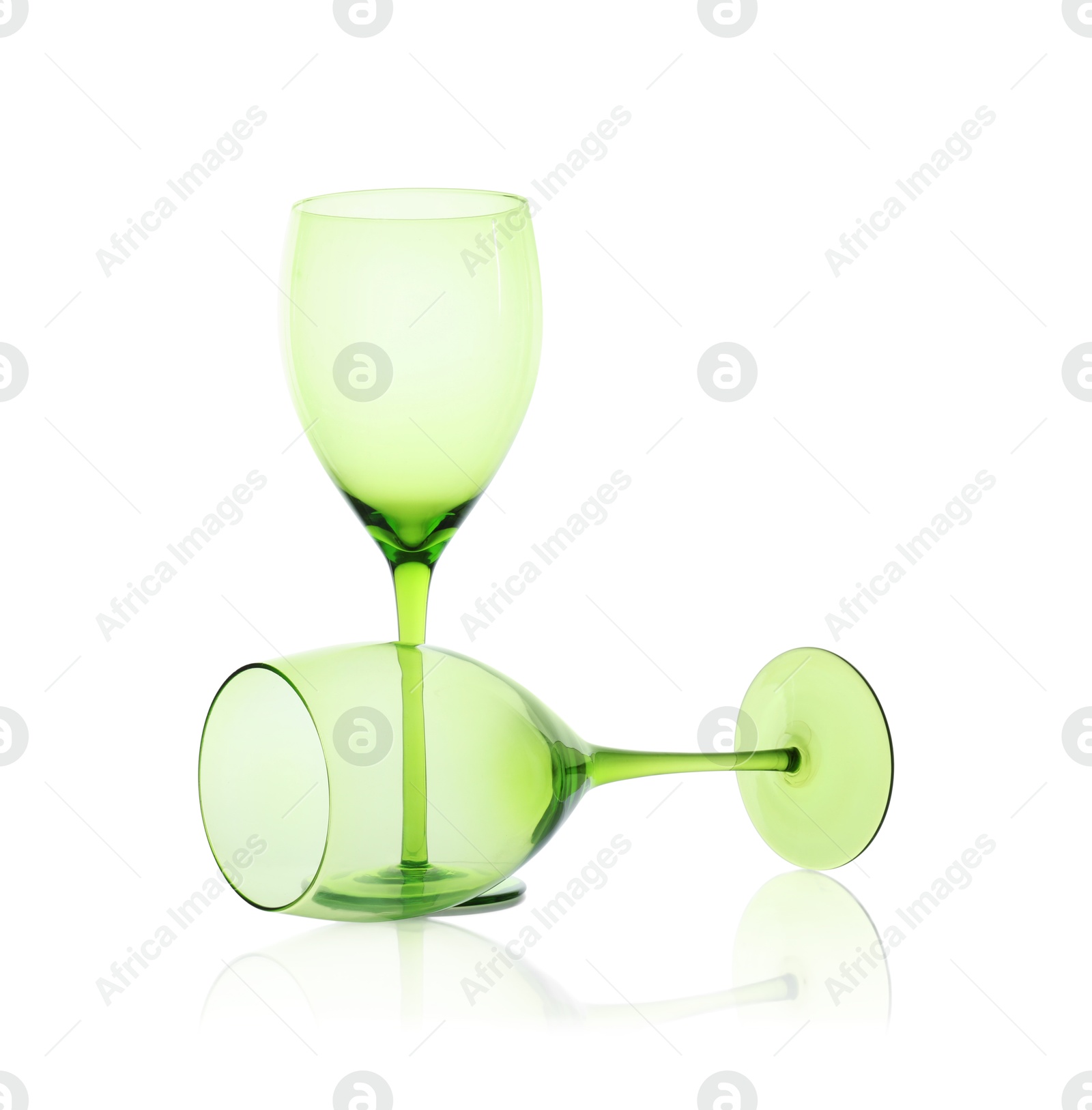 Photo of Two empty clean glasses isolated on white