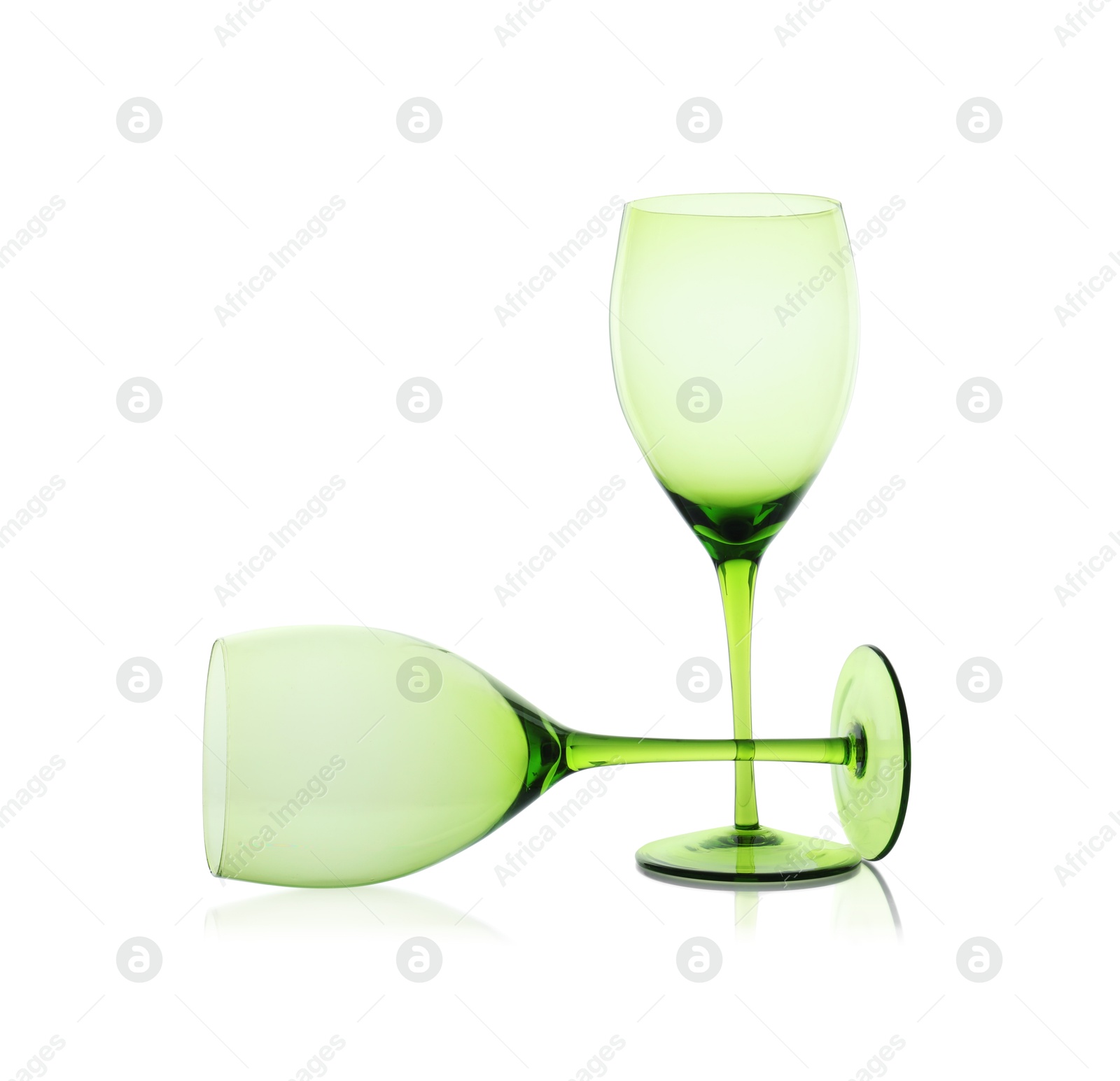 Photo of Two empty clean glasses isolated on white