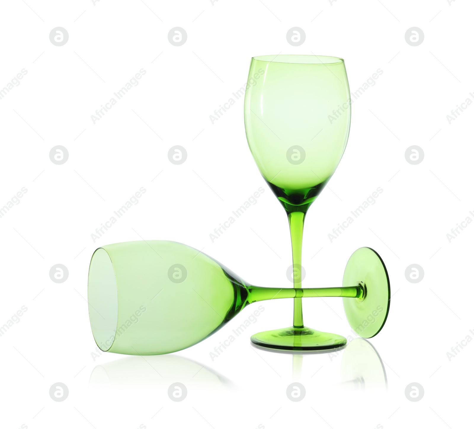 Photo of Two empty clean glasses isolated on white