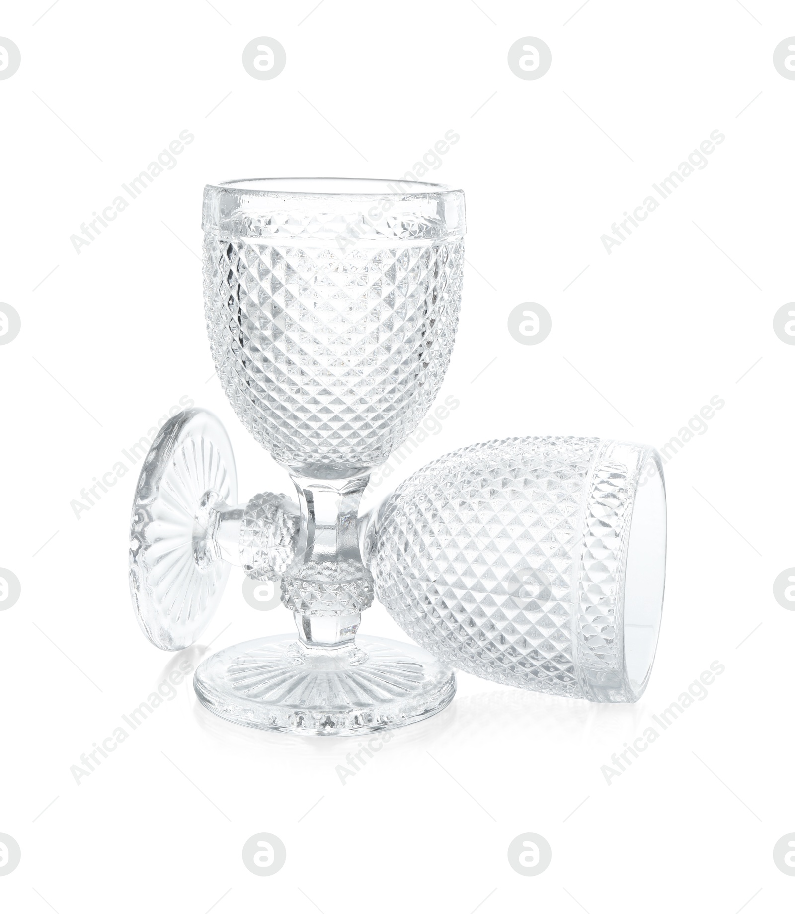 Photo of Two empty clean glasses isolated on white