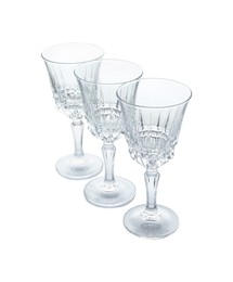 Photo of Three empty clean glasses isolated on white