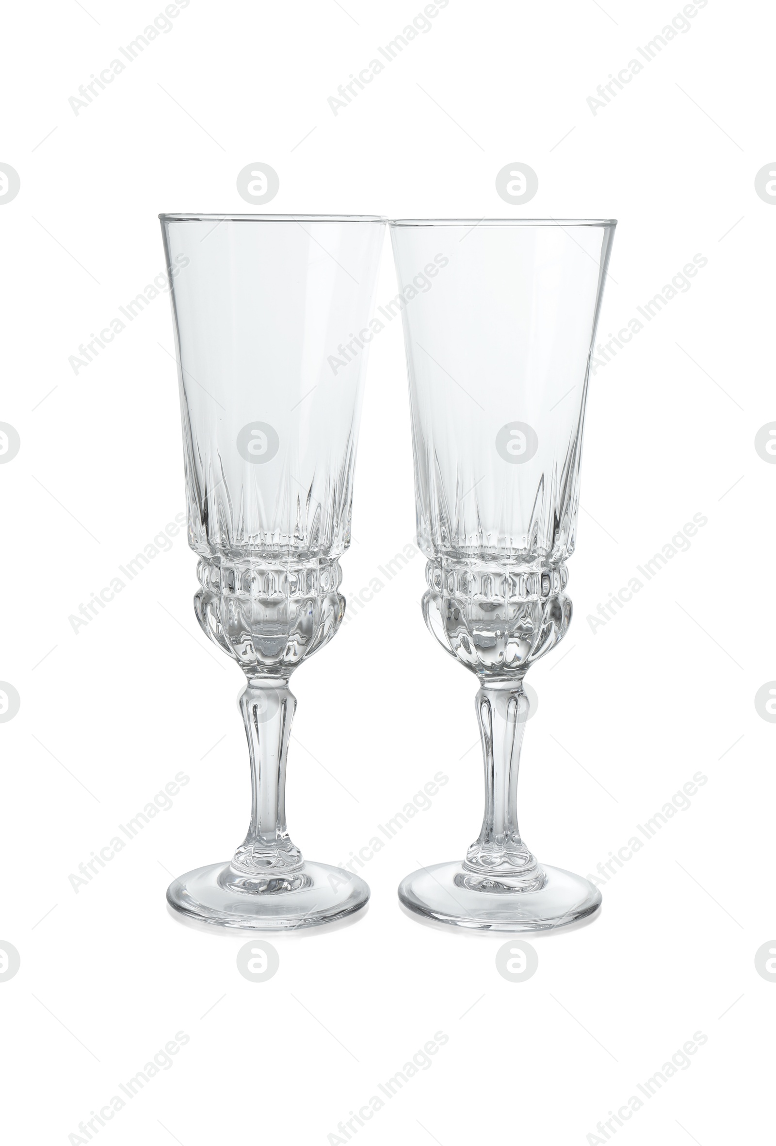 Photo of Two empty clean glasses isolated on white