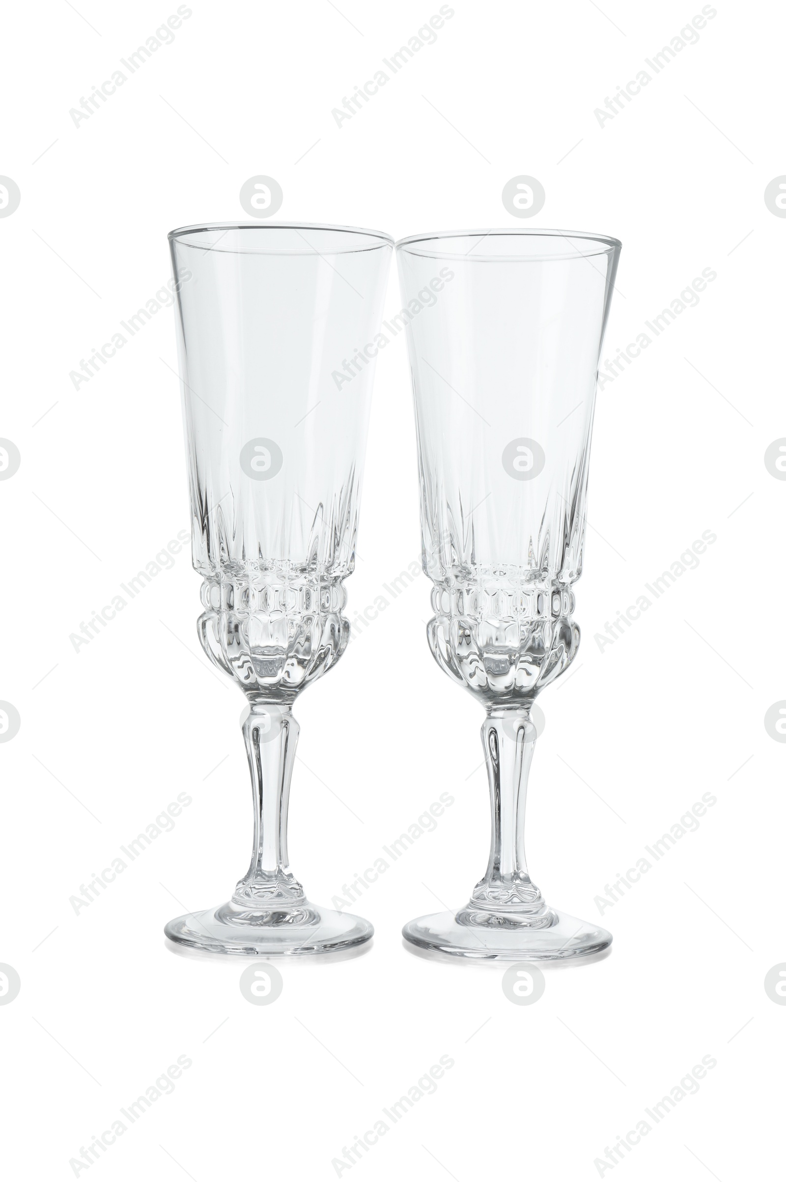 Photo of Two empty clean glasses isolated on white