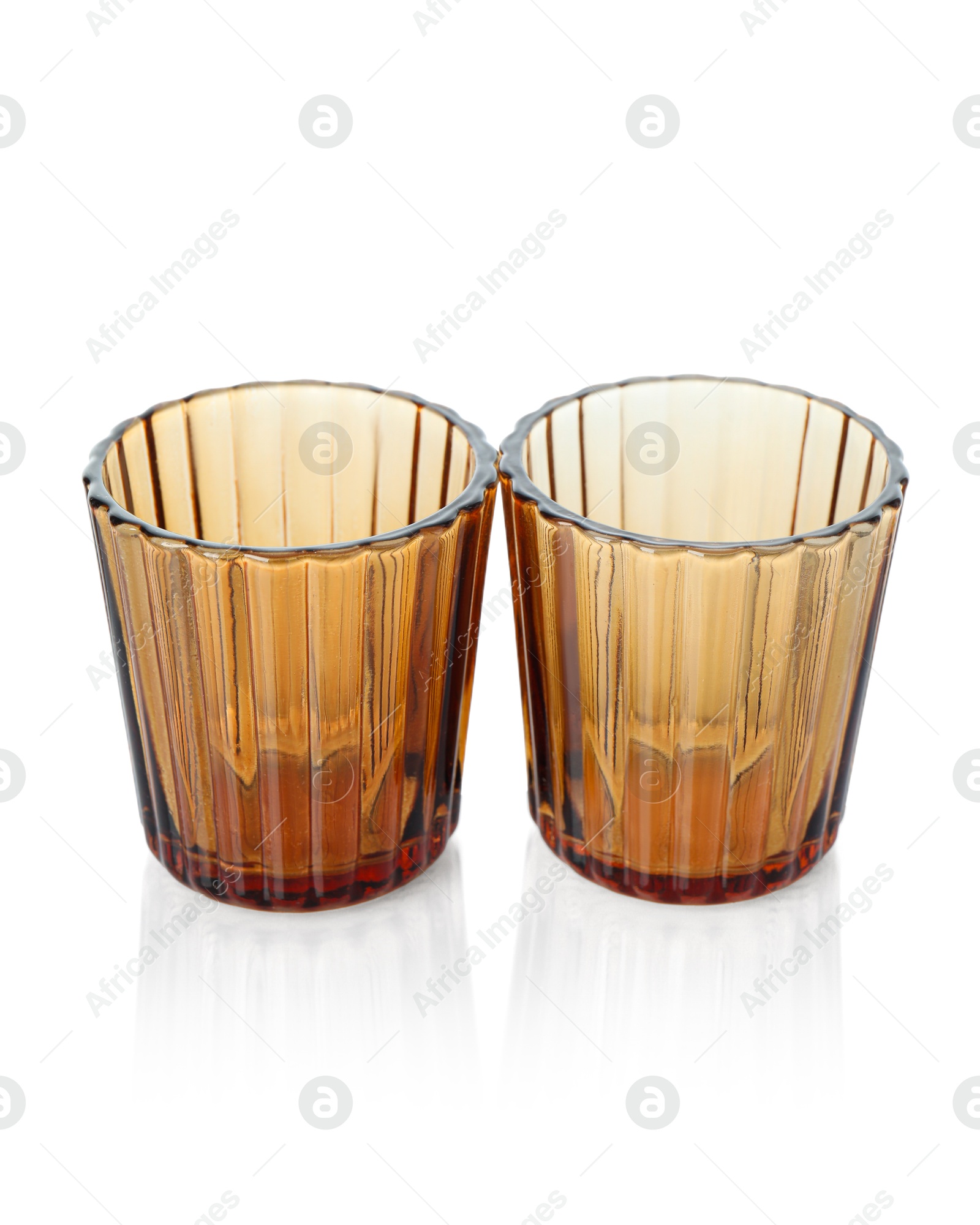 Photo of Two empty clean glasses isolated on white