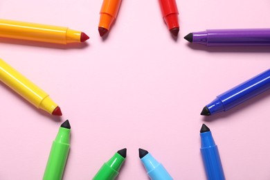 Photo of Star shape made of colorful markers on pink background, flat lay. Space for text