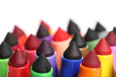 Photo of Many colorful markers on white background, closeup