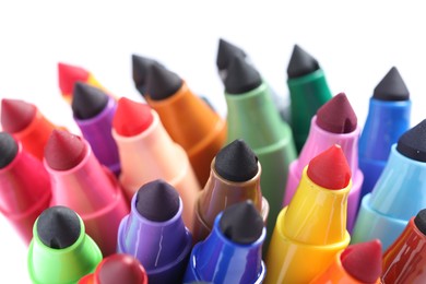 Photo of Many colorful markers on white background, closeup