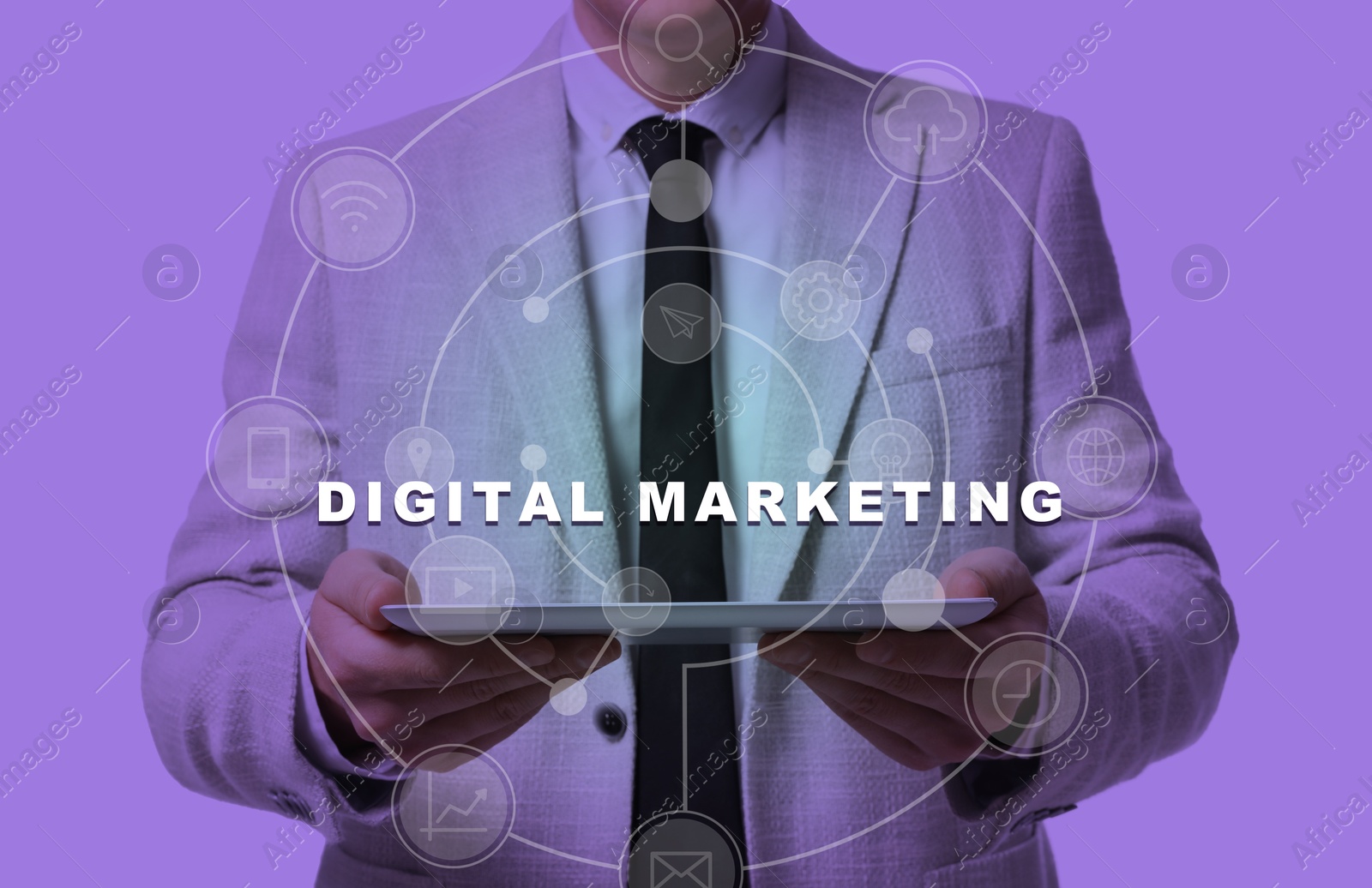 Image of Digital marketing. Businessman holding tablet computer, toned in violet. Scheme with icons around device