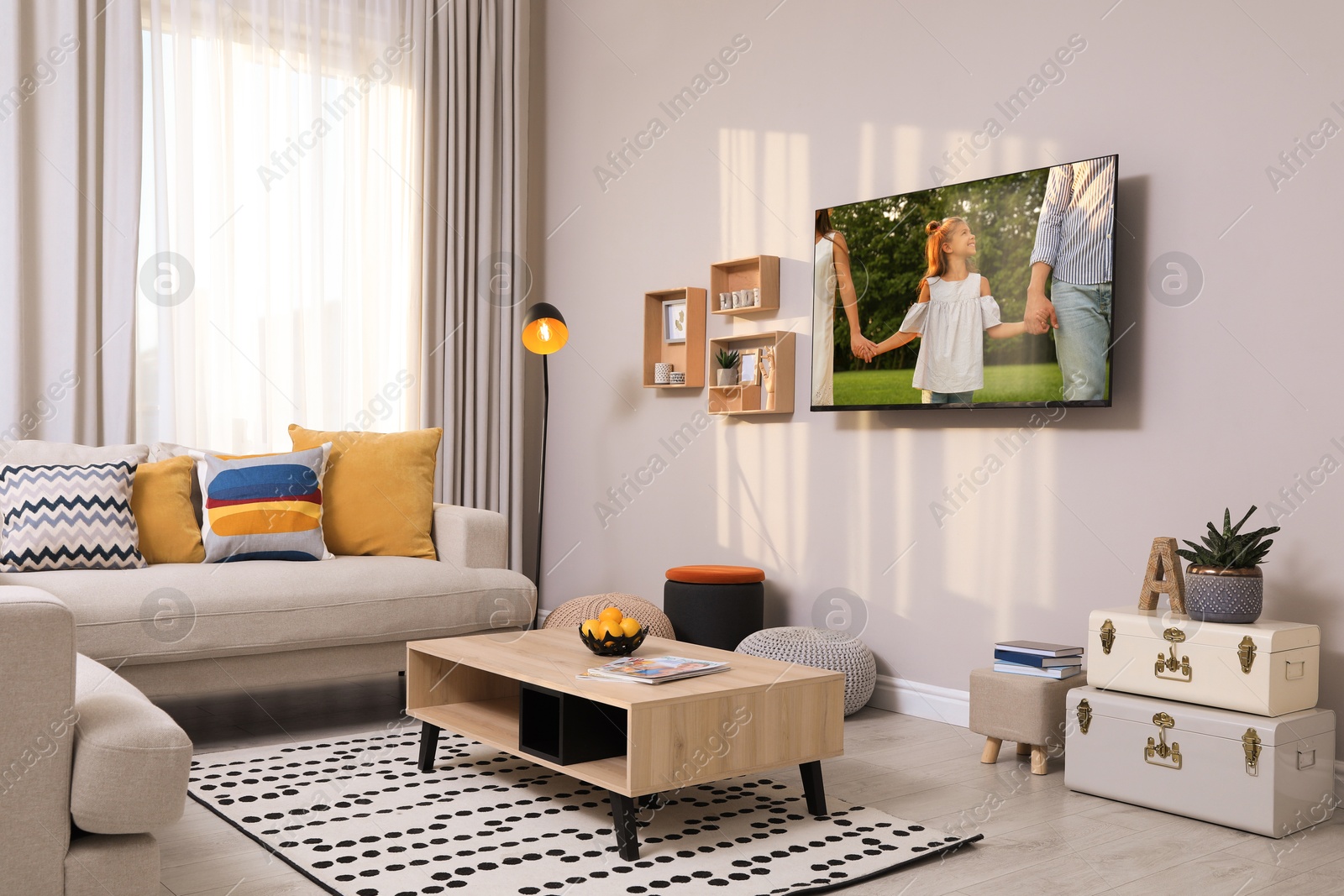 Image of Movie playing on TV set in room