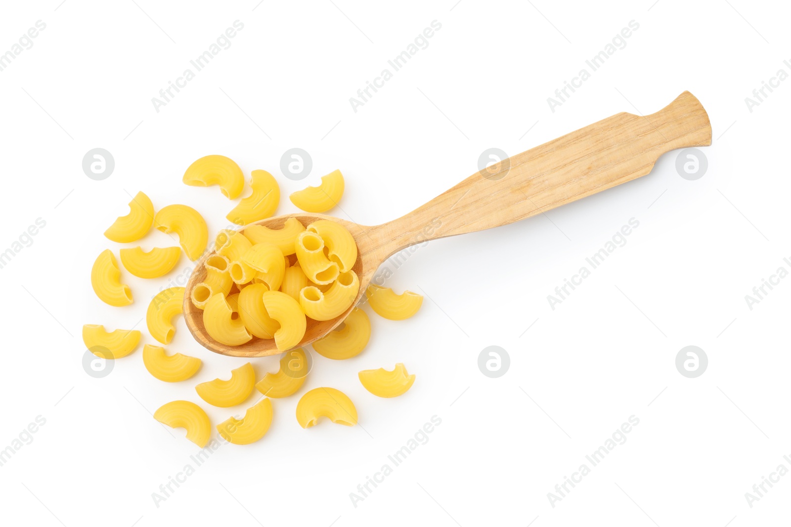 Photo of Raw horns pasta in spoon isolated on white, top view