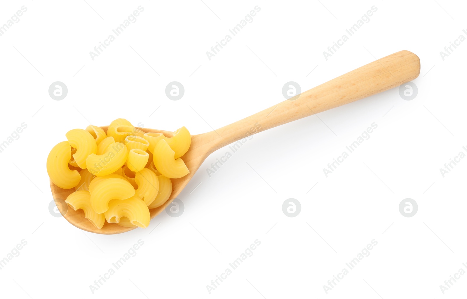 Photo of Raw horns pasta in spoon isolated on white, top view