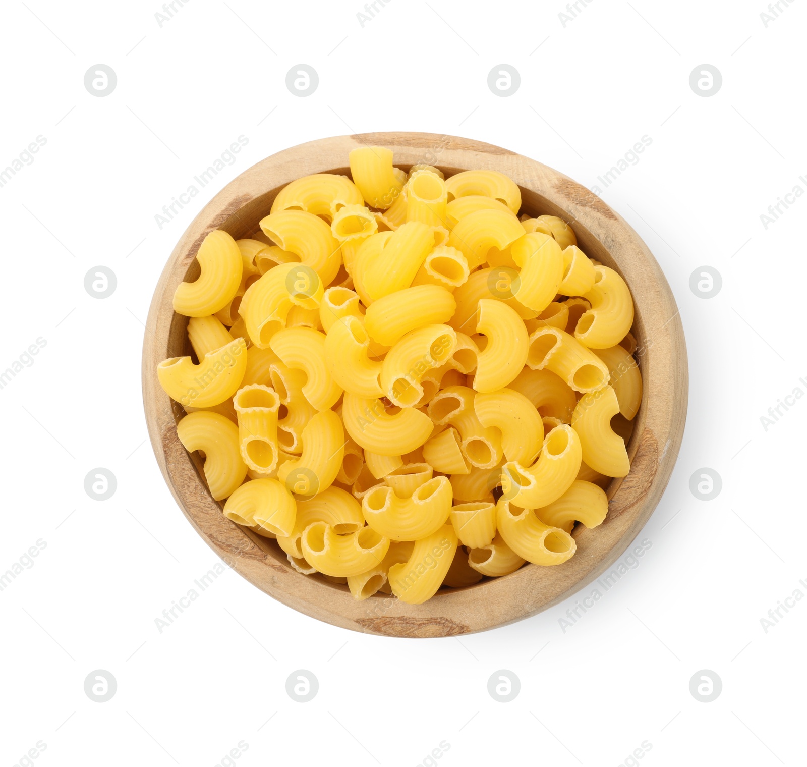 Photo of Raw horns pasta in bowl isolated on white, top view