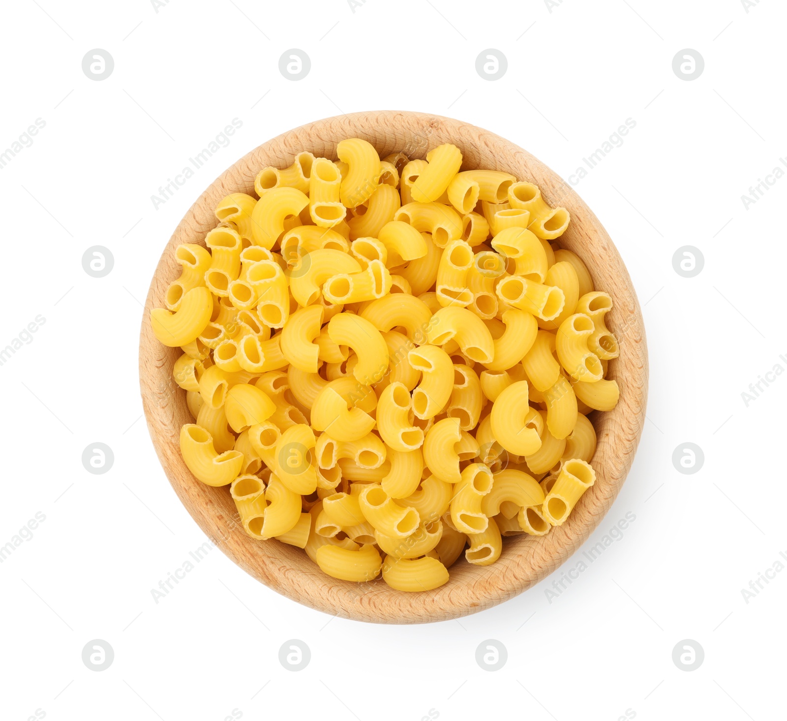 Photo of Raw horns pasta in bowl isolated on white, top view