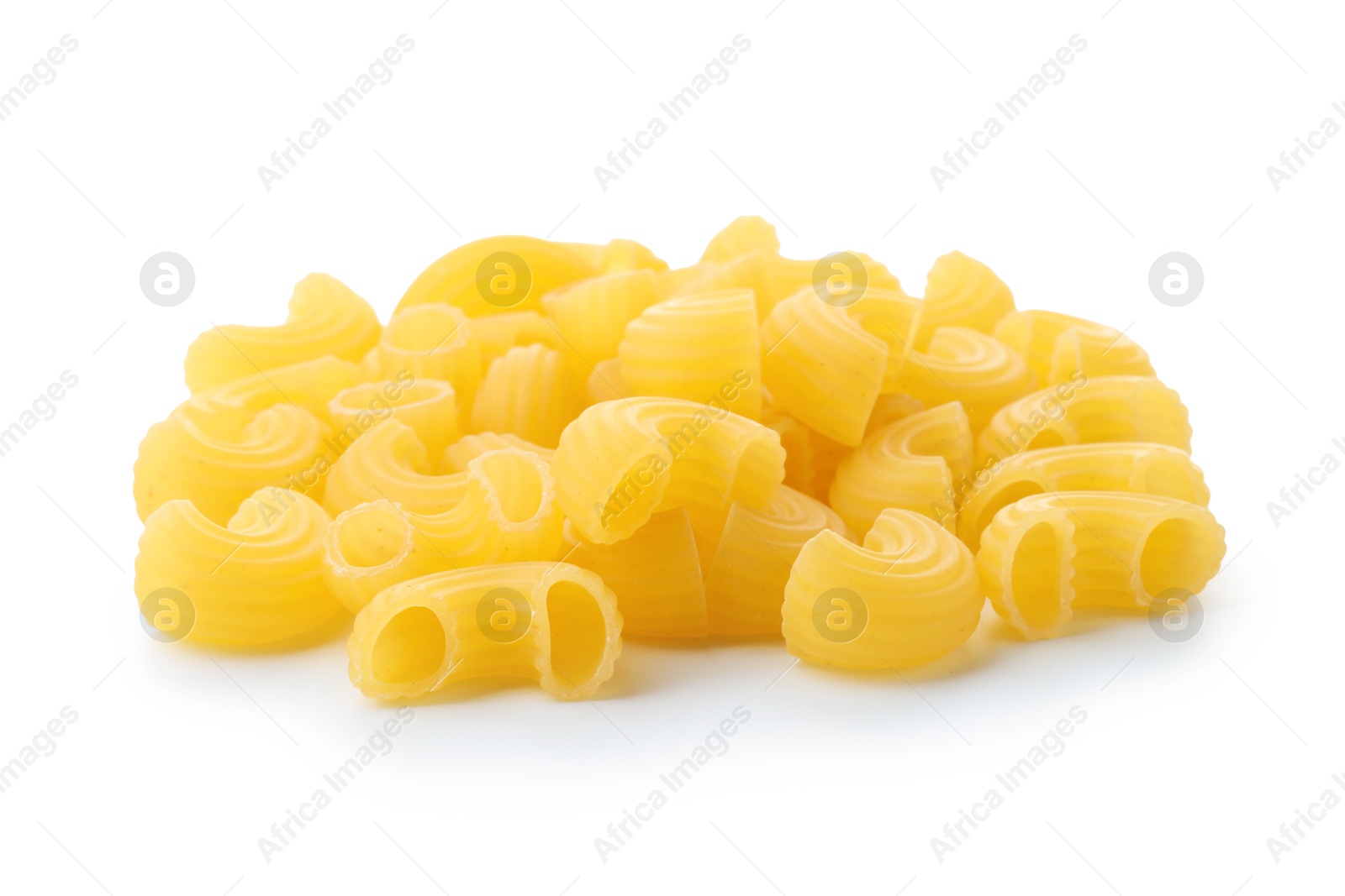 Photo of Pile of raw horns pasta isolated on white