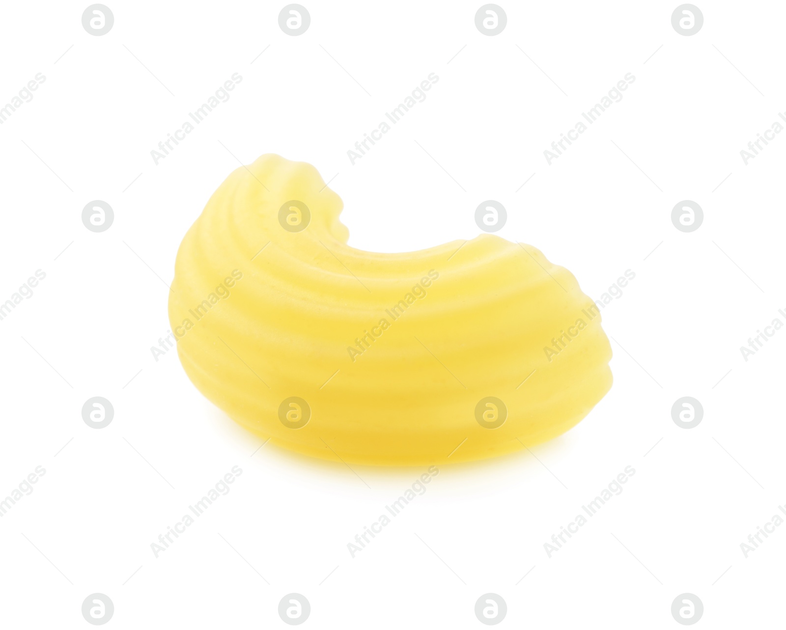 Photo of One piece of raw horns pasta isolated on white