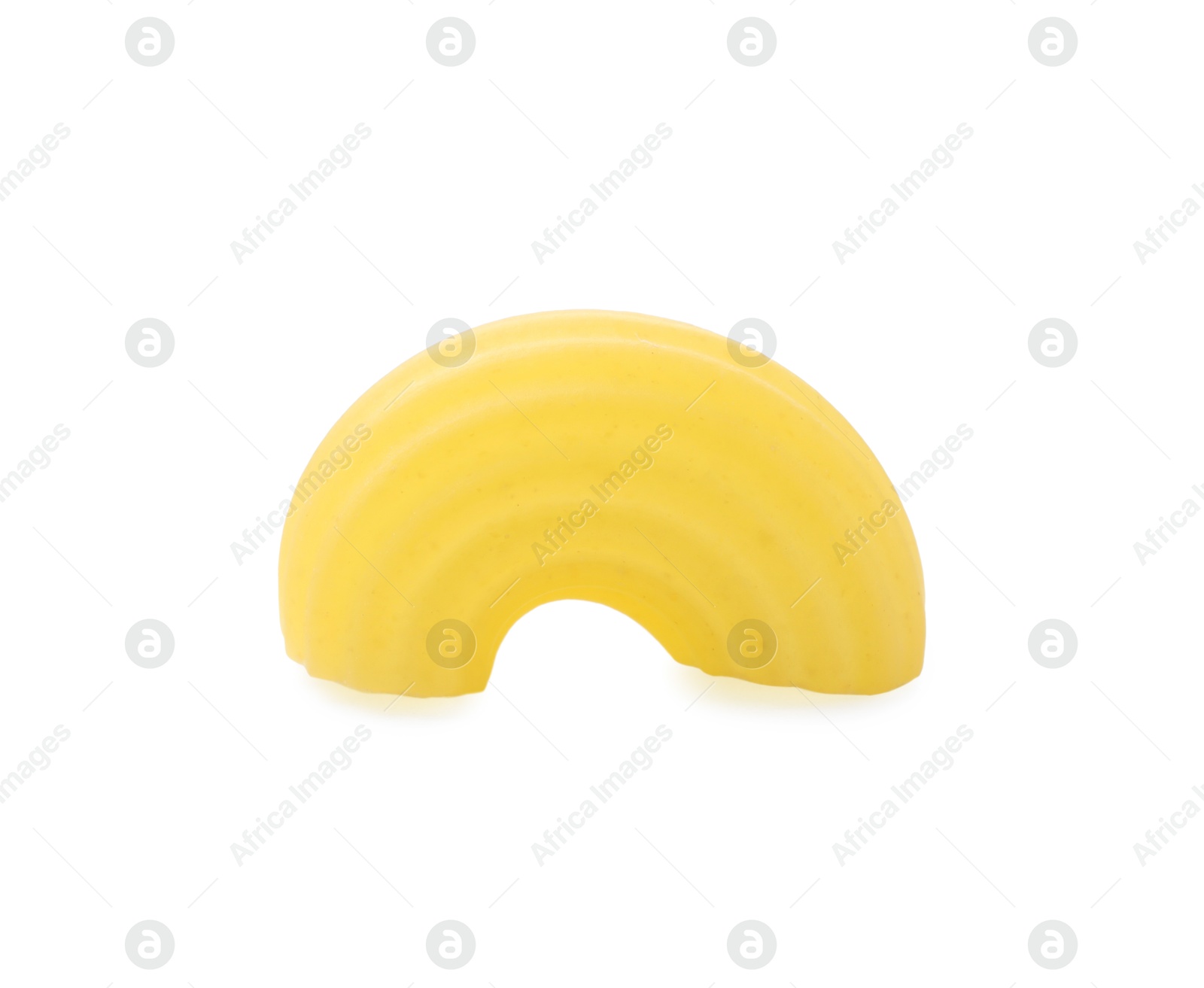 Photo of One piece of raw horns pasta isolated on white