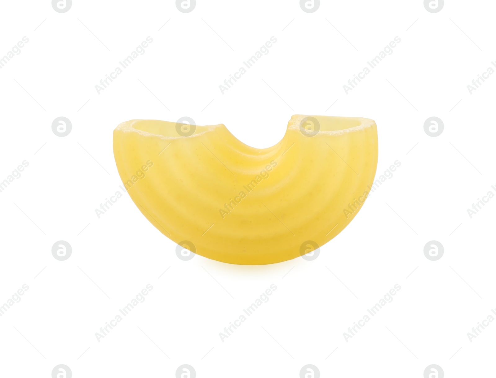 Photo of One piece of raw horns pasta isolated on white