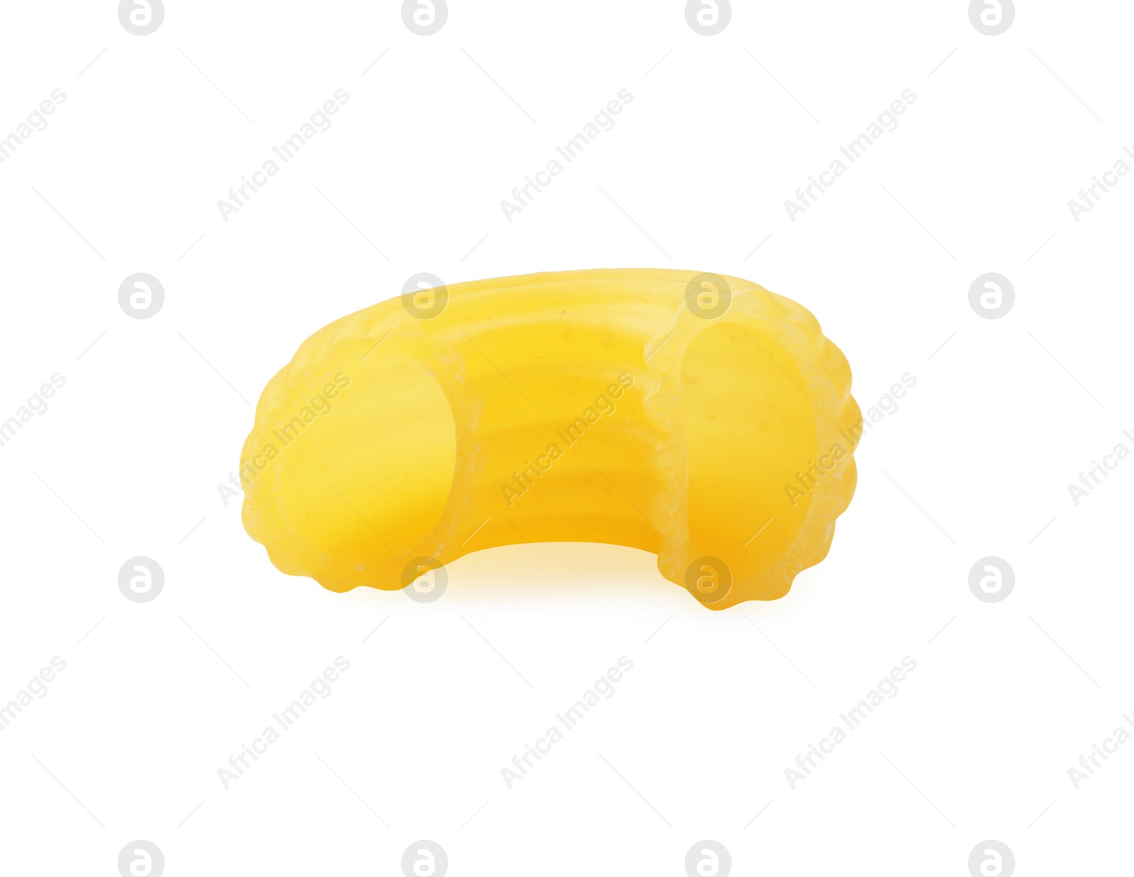 Photo of One piece of raw horns pasta isolated on white