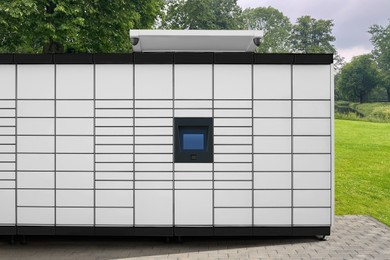 Image of Modern postal machine for parcels and letters outdoors