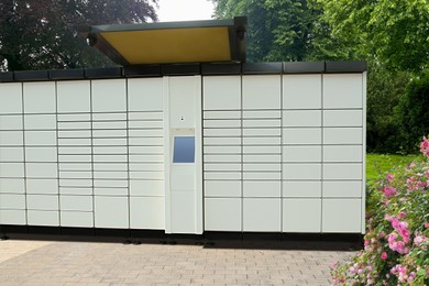 Image of Modern postal machine for parcels and letters outdoors