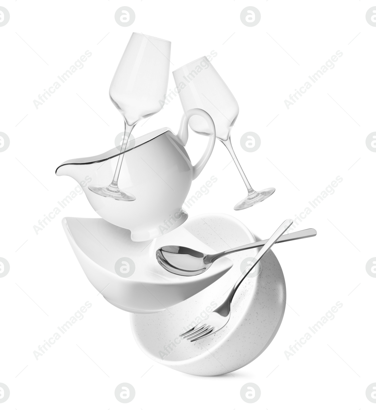 Image of Clean dishware, glasses and silverware flying on white background