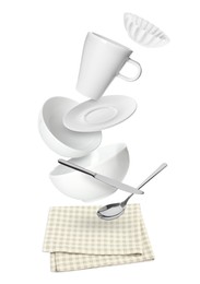 Clean dishware and silverware flying over napkin on white background