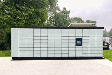 Image of Modern postal machine for parcels and letters outdoors