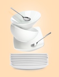 Image of Clean dishware and silverware flying over stacked plates on beige background