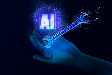 Image of Artificial intelligence in maintenance. AI abbreviation, digital wrench and hand in cyberspace