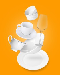 Image of Clean dishware and silverware flying over napkin on orange background