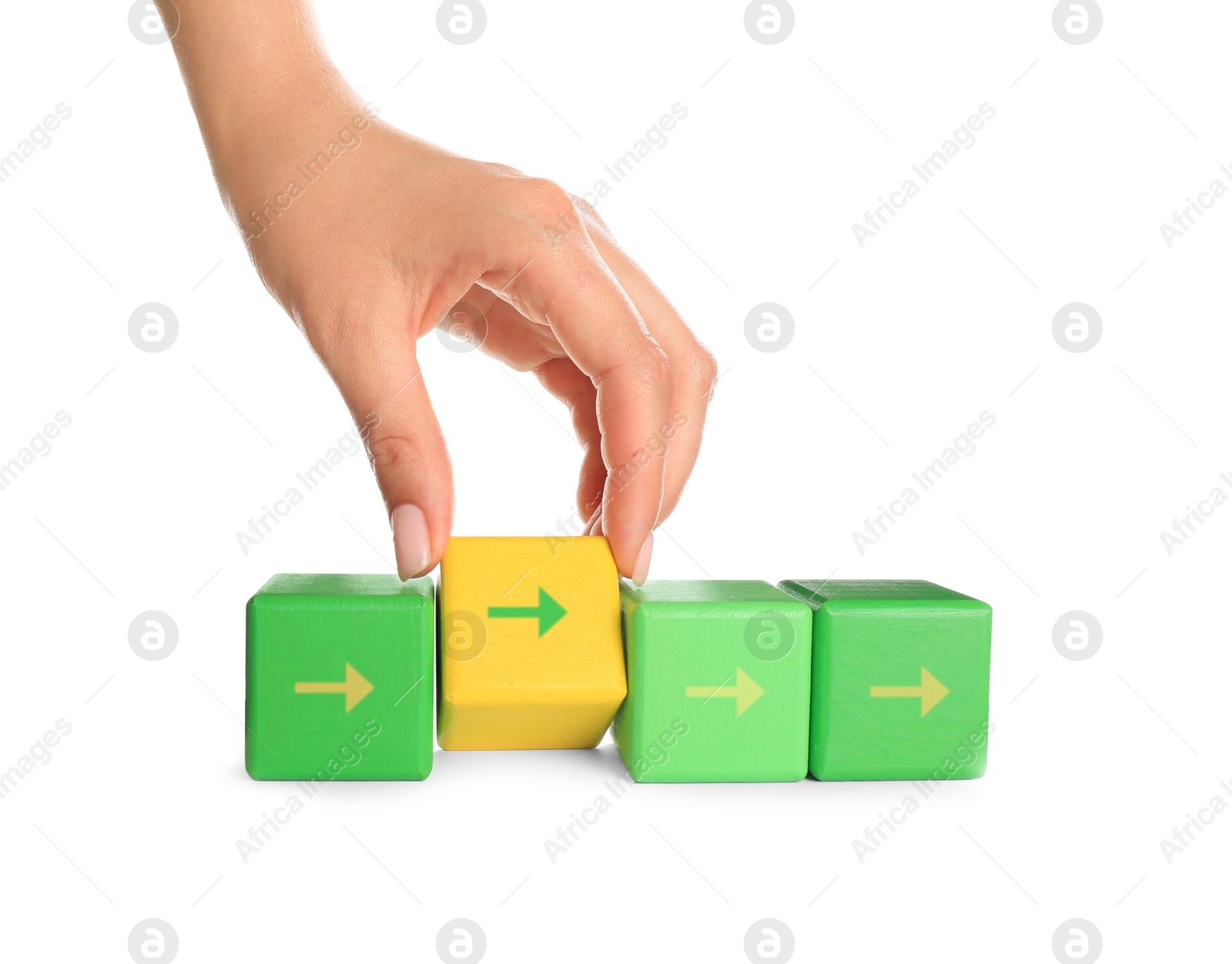 Image of Woman holding yellow cube with arrow on white background, closeup