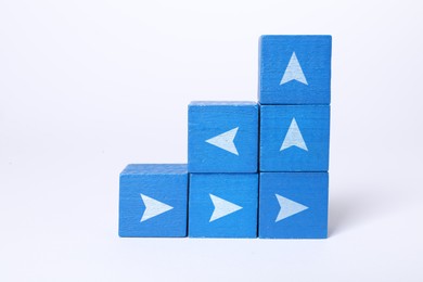 Image of Blue cubes with arrows on white background