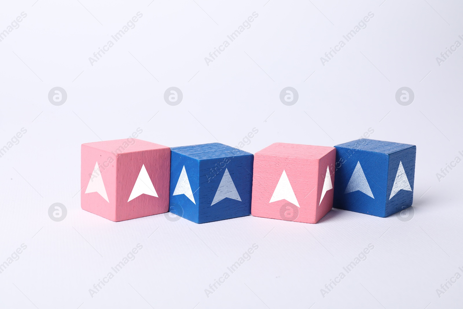 Image of Pink and blue cubes with arrows on white background