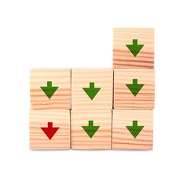 Image of Wooden cubes with green and one red arrows on white background