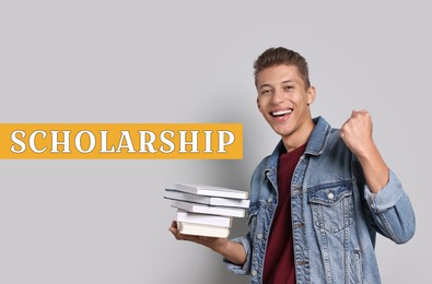 Image of Scholarship. Happy young student with books on light background