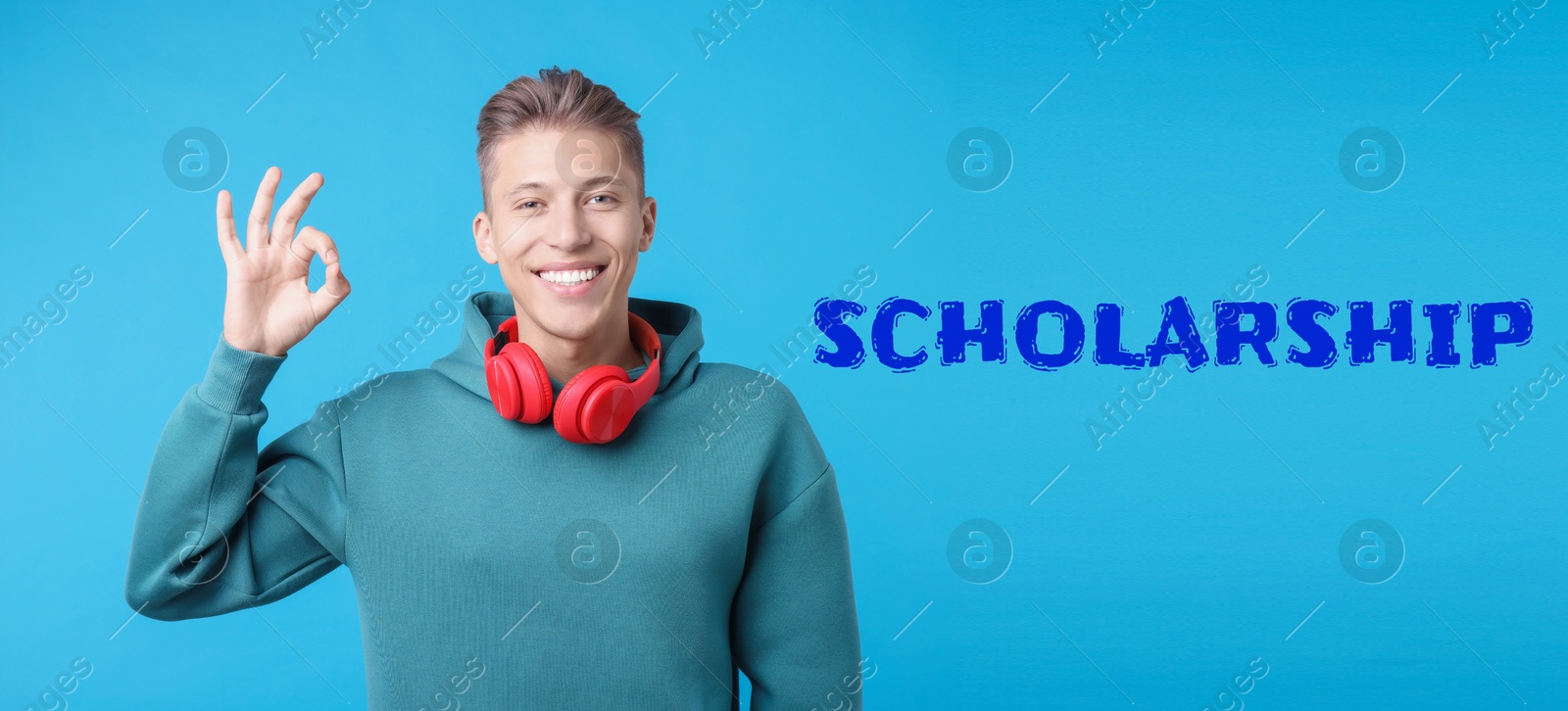 Image of Scholarship. Happy student showing ok on light blue background, banner design