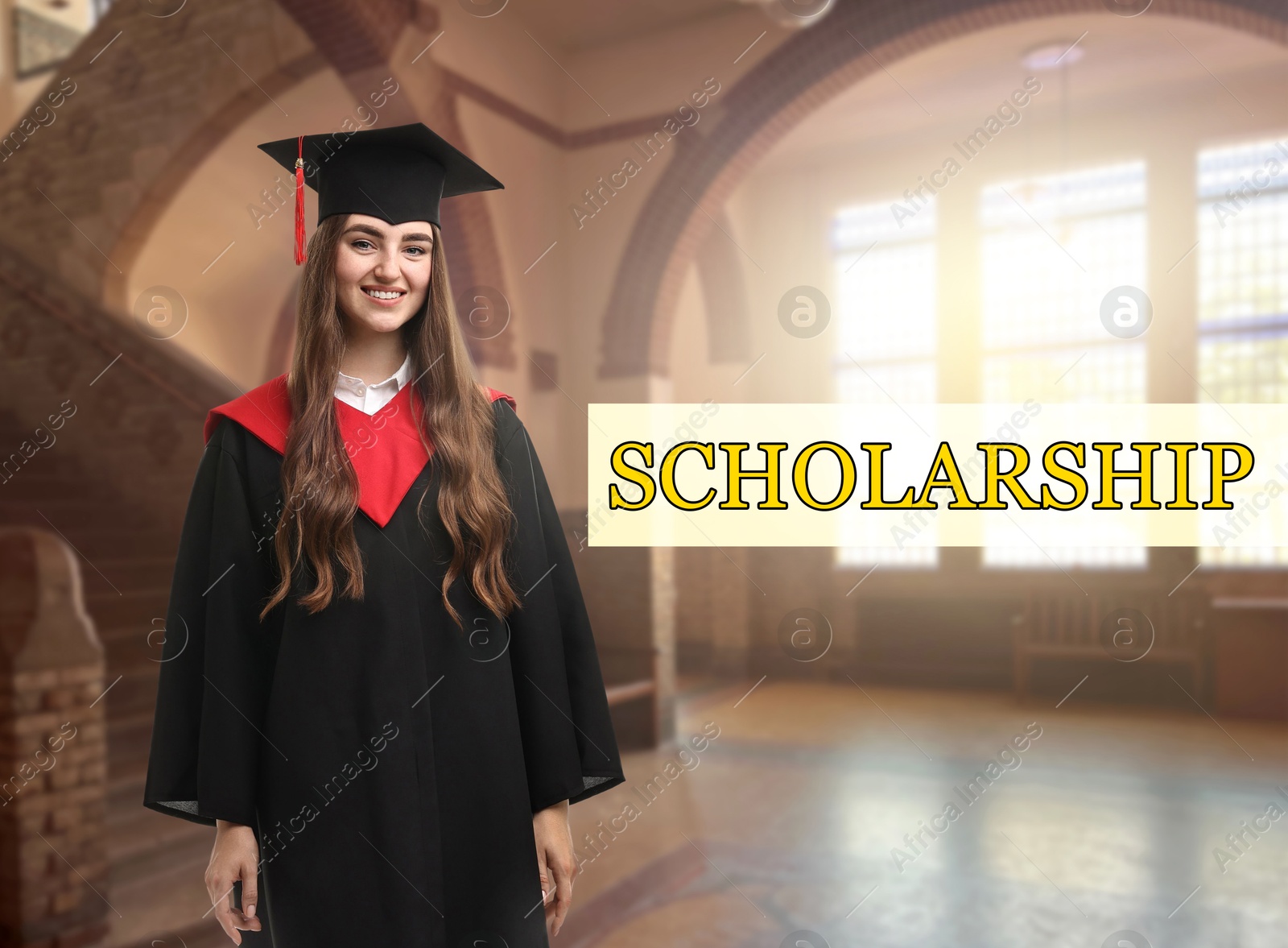 Image of Scholarship. Happy student wearing academic dress in university